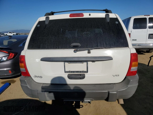 1999 Jeep Grand Cherokee Laredo z VIN 1J4GW58N8XC736438, wystawiony jako Copart lot #88605625 z przebiegiem 181 612 mil mil oraz Czysty tytuł • Clean title. Historia ofert i sprzedaży dostępna na DreamBid. Obrazek 6.
