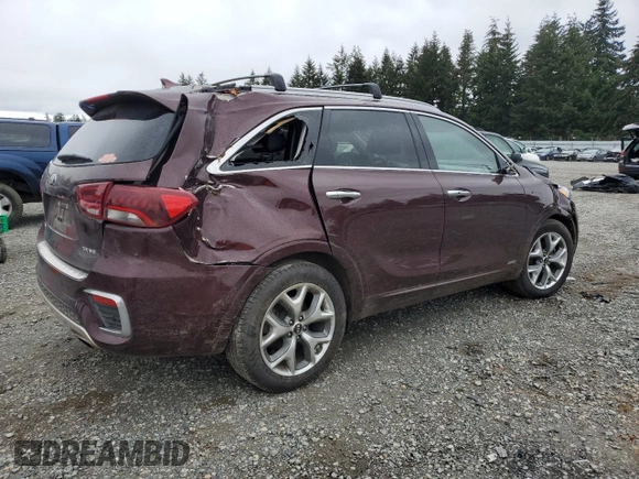 2020 Kia Sorento SX z VIN 5XYPKDA50LG696187, wystawiony jako Copart lot #50215335 z przebiegiem 95 243 mil mil oraz Szkoda całkowita • Salvage title. Historia ofert i sprzedaży dostępna na DreamBid. Obrazek 3.