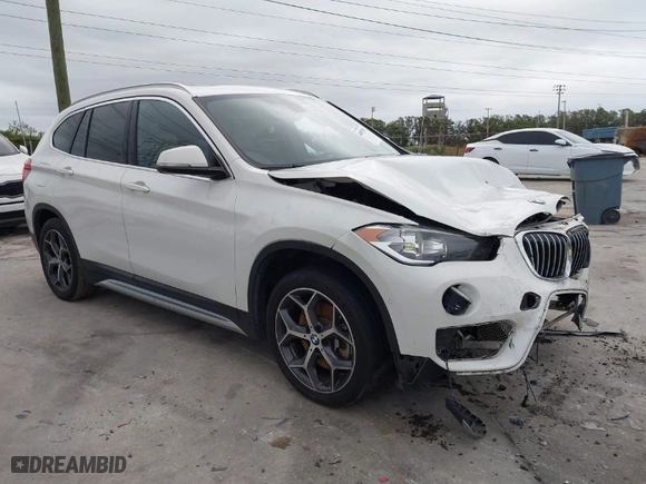 2018 BMW X1 xDrive28i with VIN WBXHT3C37J3H33461, listed as a IAAI auction lot 40997589 with 1 mi miles. Bid and sale history available at carsss.com. Image 1.
