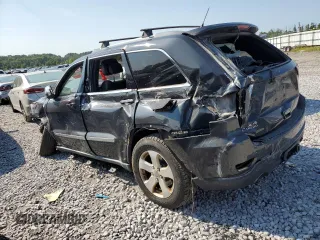 2011 Jeep Grand Cherokee 70th Anniversary with VIN 1J4RR4GT0BC632321, listed as a Copart auction lot 66772334 with 203,708 mi miles and Salvage Title. Bid and sale history available at carsss.com. Image 2.
