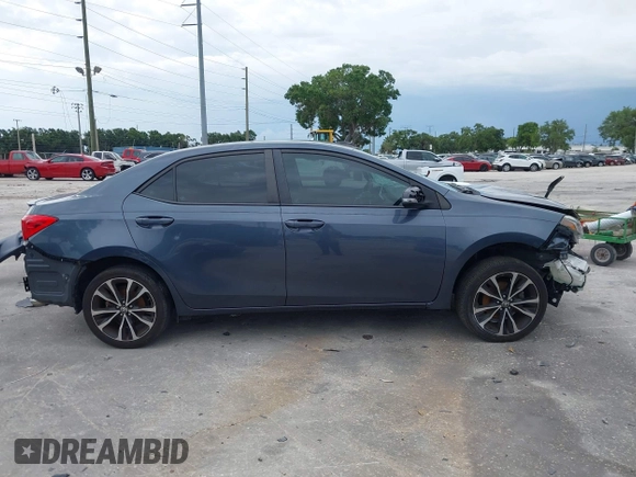 2018 Toyota Corolla L with VIN 5YFBURHE1JP814781, listed as a IAAI auction lot 42408378 with 115,543 mi miles and . Bid and sale history available at DreamBid. Image 14.
