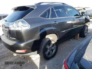 2007 Lexus RX 400h z VIN JTJGW31U172005381, wystawiony jako Copart lot #85118324 z przebiegiem 145 757 mil mil oraz Szkody całkowita. Historia ofert i sprzedaży dostępna na DreamBid. Obrazek 3.