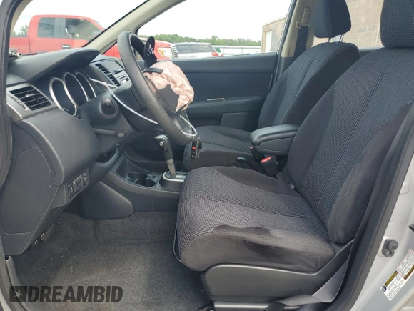 2010 Nissan Versa 1.8 SL with VIN 3N1BC1CP0AL440015, listed as a Copart auction lot 65230924 with 126,022 mi miles and Salvage Title. Bid and sale history available at carsss.com. Image 7.