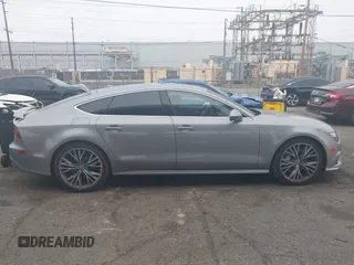 2016 Audi A7 3.0 Premium Plus with VIN WAUWGAFC0GN003357, listed as a IAAI auction lot 41468854 with 62,590 mi miles. Bid and sale history available at carsss.com. Image 13.