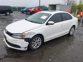2011 Volkswagen Jetta Sedan SE w/Convenience & Sunroof PZEV with VIN 3VWDZ7AJ4BM385356, listed as a IAAI auction lot 42012728 with 169,045 mi miles. Bid and sale history available at carsss.com. Image 2.