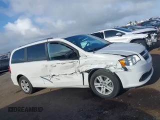 2013 Dodge Grand Caravan Crew with VIN 2C4RDGDG4DR606263, listed as a IAAI auction lot 41898351 with 127,044 mi miles and . Bid and sale history available at DreamBid. Image 13.