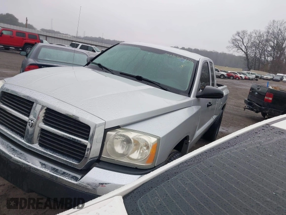2005 Dodge Dakota SLT с VIN 1D7HE42K25S309240, выставлен на аукционе IAAI как лот 41553779 с пробегом 203 769 миль миль и . История ставок и продаж доступна на DreamBid. Изображение 2.