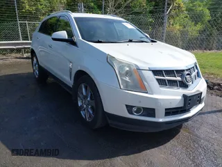 2012 Cadillac SRX Performance Collection z VIN 3GYFNBE30CS599466, wystawiony jako IAAI lot #42053911 z przebiegiem 167 242 mil mil oraz . Historia ofert i sprzedaży dostępna na DreamBid. Obrazek 1.