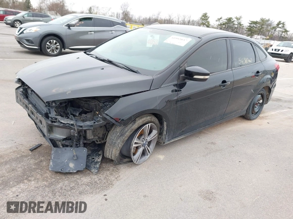 2017 Ford Focus SE with VIN 1FADP3FE4HL307110, listed as a IAAI auction lot 41992037 with 54,380 mi miles and . Bid and sale history available at DreamBid. Image 2.