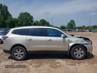 2015 Chevrolet Traverse LT z VIN 1GNKRHKD7FJ109076, wystawiony jako IAAI lot #42032817 z przebiegiem 62 830 mil mil oraz . Historia ofert i sprzedaży dostępna na DreamBid. Obrazek 13.