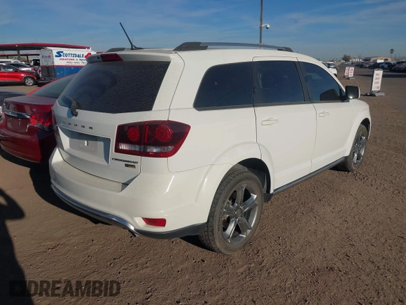 2017 Dodge Journey Crossroad Plus z VIN 3C4PDCGG4HT575546, wystawiony jako IAAI lot #41477700 z przebiegiem 176 968 mil mil oraz . Historia ofert i sprzedaży dostępna na DreamBid. Obrazek 4.