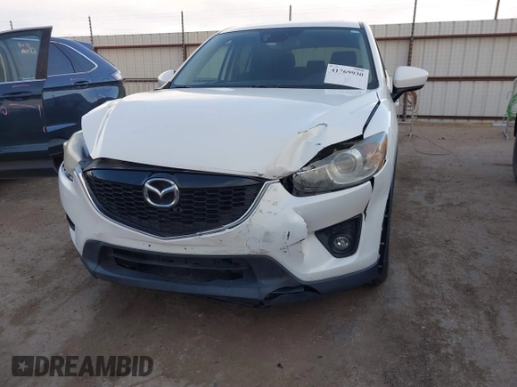 2014 Mazda CX-5 Touring with VIN JM3KE2CY8E0321578, listed as a IAAI auction lot 41769930 with 101,724 mi miles. Bid and sale history available at carsss.com. Image 6.