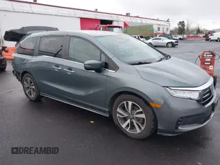 2021 Honda Odyssey Touring with VIN 5FNRL6H86MB001298, listed as a IAAI auction lot 41721738 with 85,680 mi miles. Bid and sale history available at carsss.com. Image 1.