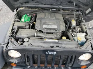2012 Jeep Wrangler Unlimited Sport z VIN 1C4BJWDG9CL102626, wystawiony jako Copart lot #58421455 z przebiegiem 128 421 mil mil oraz Szkoda całkowita • Salvage title. Historia ofert i sprzedaży dostępna na DreamBid. Obrazek 12.