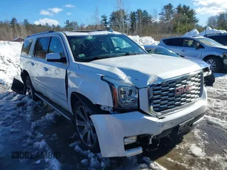 2019 GMC Yukon XL Denali with VIN 1GKS2HKJ6KR191305, listed as a IAAI auction lot 41569554 with 93,859 mi miles. Bid and sale history available at carsss.com. Image 1.