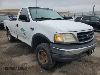 2000 Ford F-150 with VIN 1FTRF18W8YKA60791, listed as a Copart auction lot 45215895 with 157,885 mi miles and Clean title. Bid and sale history available at DreamBid. Image 4.
