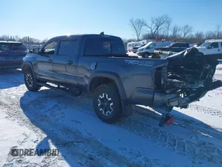 2017 Toyota Tacoma SR5 with VIN 3TMDZ5BN1HM021199, listed as a IAAI auction lot 41387400 with 93,392 mi miles. Bid and sale history available at carsss.com. Image 3.
