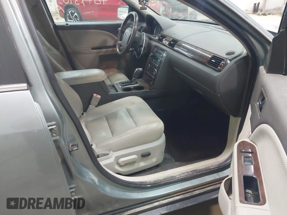 2008 Ford Taurus SEL with VIN 1FAHP24W18G159322, listed as a IAAI auction lot 42144590 with 163,397 mi miles and . Bid and sale history available at DreamBid. Image 5.