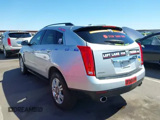 2014 Cadillac SRX with VIN 3GYFNAE31ES576016, listed as a IAAI auction lot 42130992 with 160,114 mi miles and . Bid and sale history available at DreamBid. Image 3.