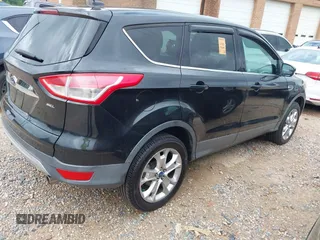 2013 Ford Escape SEL with VIN 1FMCU9H97DUA80867, listed as a IAAI auction lot 42709994 with Not provided miles and . Bid and sale history available at DreamBid. Image 4.