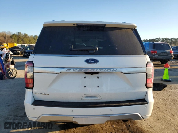 2020 Ford Expedition Platinum with VIN 1FMJU1LT2LEA61065, listed as a Copart auction lot 42641325 with 91,528 mi miles and Salvage title. Bid and sale history available at DreamBid. Image 6.