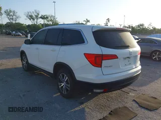 2017 Honda Pilot EX-L with VIN 5FNYF6H51HB037690, listed as a IAAI auction lot 41976359 with 126,055 mi miles and . Bid and sale history available at DreamBid. Image 3.