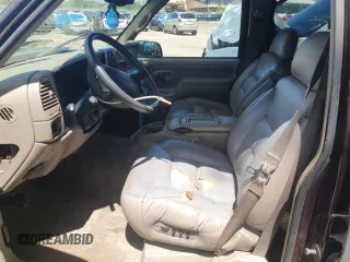 1997 GMC Suburban with VIN 3GKFK16R4VG518331, listed as a Copart auction lot 56241425 with 265,201 mi miles and Non repairable. Bid and sale history available at DreamBid. Image 7.