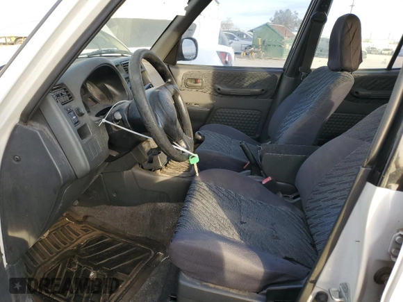 1998 Toyota RAV4 with VIN JT3GP10V9W7029884, listed as a Copart auction lot 87432264 with 190,451 mi miles and Clean title. Bid and sale history available at DreamBid. Image 7.