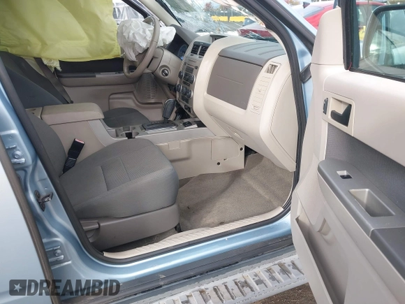 2009 Ford Escape Hybrid with VIN 1FMCU49309KB71172, listed as a IAAI auction lot 40971257 with 118,689 mi miles. Bid and sale history available at carsss.com. Image 5.