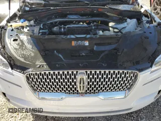 2021 Lincoln Aviator Reserve z VIN 5LM5J7WCXMGL18310, wystawiony jako Copart lot #76247904 z przebiegiem 69 111 mil mil oraz Nie do naprawy • Non repairable. Historia ofert i sprzedaży dostępna na DreamBid. Obrazek 12.