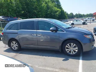 2014 Honda Odyssey EX-L with VIN 5FNRL5H63EB073585, listed as a IAAI auction lot 42673004 with 119,971 mi miles and . Bid and sale history available at DreamBid. Image 13.