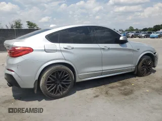 2018 BMW X4 M40i z VIN 5UXXW7C55J0W63724, wystawiony jako Copart lot #55757755 z przebiegiem 149 480 mil mil oraz Tytuł czysty. Historia ofert i sprzedaży dostępna na DreamBid. Obrazek 3.
