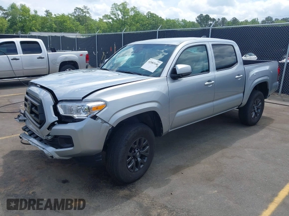 2023 Toyota Tacoma SR with VIN 3TYCZ5AN4PT149730, listed as a IAAI auction lot 42083146 with 31,731 mi miles and . Bid and sale history available at DreamBid. Image 2.