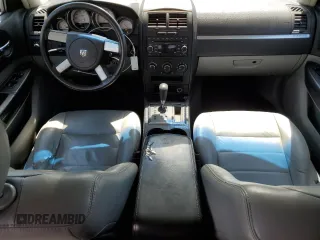 2008 Dodge Charger z VIN 2B3LA43GX8H294087, wystawiony jako Copart lot #54843755 z przebiegiem 208 359 mil mil oraz Szkoda całkowita • Salvage title. Historia ofert i sprzedaży dostępna na DreamBid. Obrazek 8.