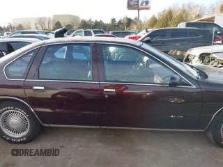 1995 Chevrolet Caprice Classic with VIN 1G1BL52W1SR104079, listed as a IAAI auction lot 41384358 with 1 mi miles. Bid and sale history available at carsss.com. Image 13.