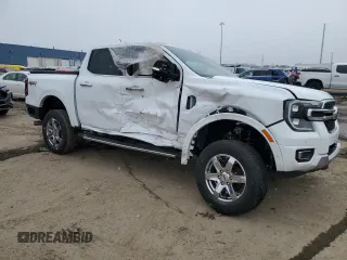 2024 Ford Ranger Lariat with VIN 1FTER4KH6RLE01036, listed as a Copart auction lot 48386655 with 2,001 mi miles and Salvage title. Bid and sale history available at DreamBid. Image 4.