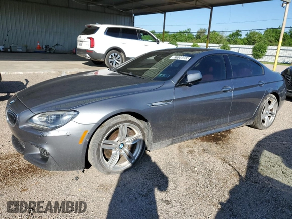 2014 BMW 6 Series 650i xDrive z VIN WBA6B4C53ED371461, wystawiony jako Copart lot #51136055 z przebiegiem 143 213 mil mil oraz Tytuł czysty. Historia ofert i sprzedaży dostępna na DreamBid. Obrazek 1.