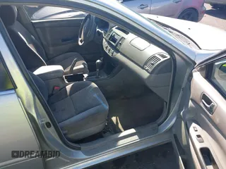 2005 Toyota Camry STD z VIN 4T1BE32K95U419292, wystawiony jako IAAI lot #42302496 z przebiegiem 233 632 mil mil oraz . Historia ofert i sprzedaży dostępna na DreamBid. Obrazek 5.