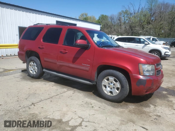 2012 Chevrolet Tahoe LS with VIN 1GNSCAE02CR319700, listed as a Copart auction lot 50321735 with 180,403 mi miles and Salvage title. Bid and sale history available at DreamBid. Image 4.