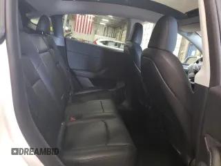 2023 Tesla Model Y Long Range z VIN 7SAYGDEE5PA067389, wystawiony jako Copart lot #54109625 z przebiegiem 24 849 mil mil oraz Szkody całkowita. Historia ofert i sprzedaży dostępna na DreamBid. Obrazek 11.