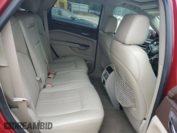 2014 Cadillac SRX Performance Collection z VIN 3GYFNCE32ES560497, wystawiony jako Copart lot #53107835 z przebiegiem 140 378 mil mil oraz Szkoda całkowita • Salvage title. Historia ofert i sprzedaży dostępna na DreamBid. Obrazek 11.