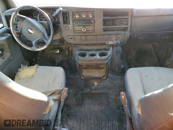 2012 Chevrolet Express Passenger 1LS with VIN 1GAZGZFA8C1191908, listed as a Copart auction lot 46998515 with 220,513 mi miles and Clean title. Bid and sale history available at DreamBid. Image 8.