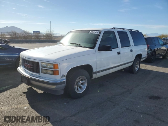 1999 GMC Suburban with VIN 3GKEC16R6XG538009, listed as a Copart auction lot 87112424 with 220,487 mi miles and Clean Title. Bid and sale history available at DreamBid. Image 1.