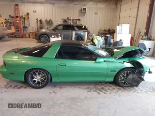 2000 Chevrolet Camaro Z28 z VIN 2G1FP22G0Y2103689, wystawiony jako IAAI lot #42173195 z przebiegiem Nie podano mil oraz . Historia ofert i sprzedaży dostępna na DreamBid. Obrazek 12.