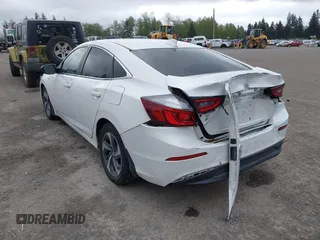2019 Honda Insight LX with VIN 19XZE4F10KE010635, listed as a IAAI auction lot 42084158 with 105,606 mi miles and . Bid and sale history available at carsss.com. Image 3.