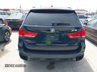 2014 BMW X5 xDrive50i with VIN 5UXKR6C55E0C03743, listed as a IAAI auction lot 42268302 with 118,892 mi miles and . Bid and sale history available at DreamBid. Image 16.