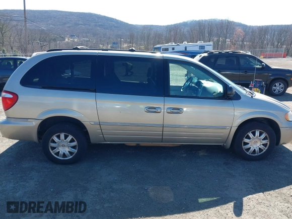 2006 Chrysler Town & Country Touring with VIN 2A8GP54L06R727898, listed as a IAAI auction lot 41893586 with 119,296 mi miles and . Bid and sale history available at DreamBid. Image 13.