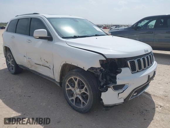 2018 Jeep Grand Cherokee Limited with VIN 1C4RJEBG3JC125652, listed as a IAAI auction lot 41921124 with Not provided miles and . Bid and sale history available at DreamBid. Image 6.
