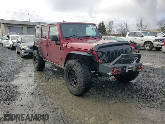 2012 Jeep Wrangler Unlimited Rubicon with VIN 1C4HJWFG2CL219021, listed as a Copart auction lot 87451784 with 109,675 mi miles and Salvage title. Bid and sale history available at DreamBid. Image 11.