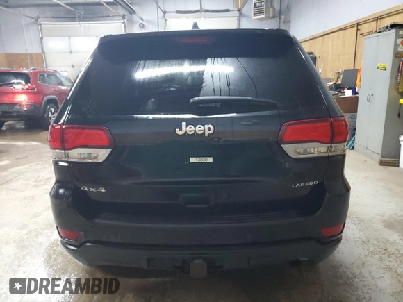 2021 Jeep Grand Cherokee Laredo E with VIN 1C4RJFAG4MC717010, listed as a Copart auction lot 56033035 with 75,054 mi miles and Salvage title. Bid and sale history available at DreamBid. Image 6.